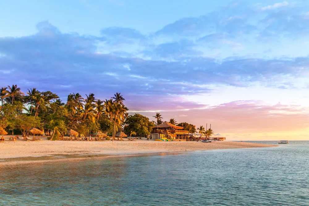Magical sunset over the islands of Fiji, one of the best places to visit in the month of August