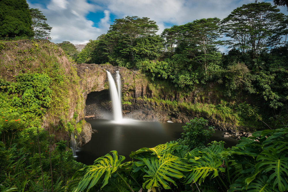 Rainbow Falls in Hilo on the Big Island pictured with water falling into a still pond below