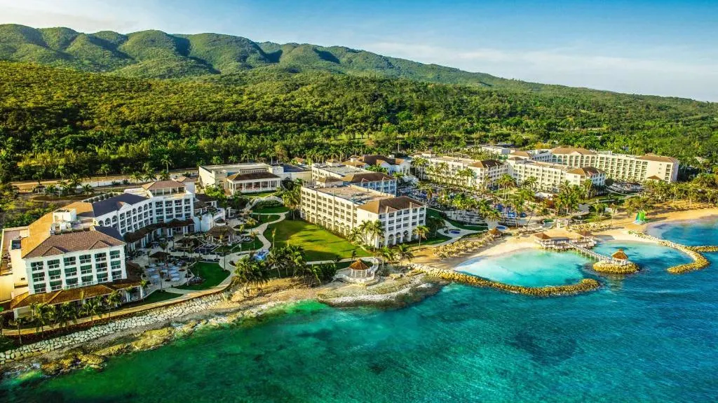 Aerial image of one of the best all-inclusive resorts in Jamaica, the Hyatt Ziva Rose Hall, as seen looking down toward the beach and ocean and pool