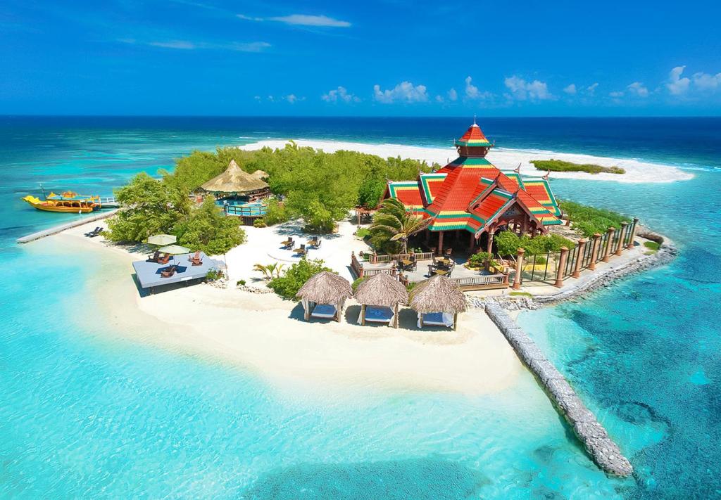 Neat private island at Sandals Royal Caribbean with teal water all around, highlighted as one of the best all-inclusive resorts in Jamaica