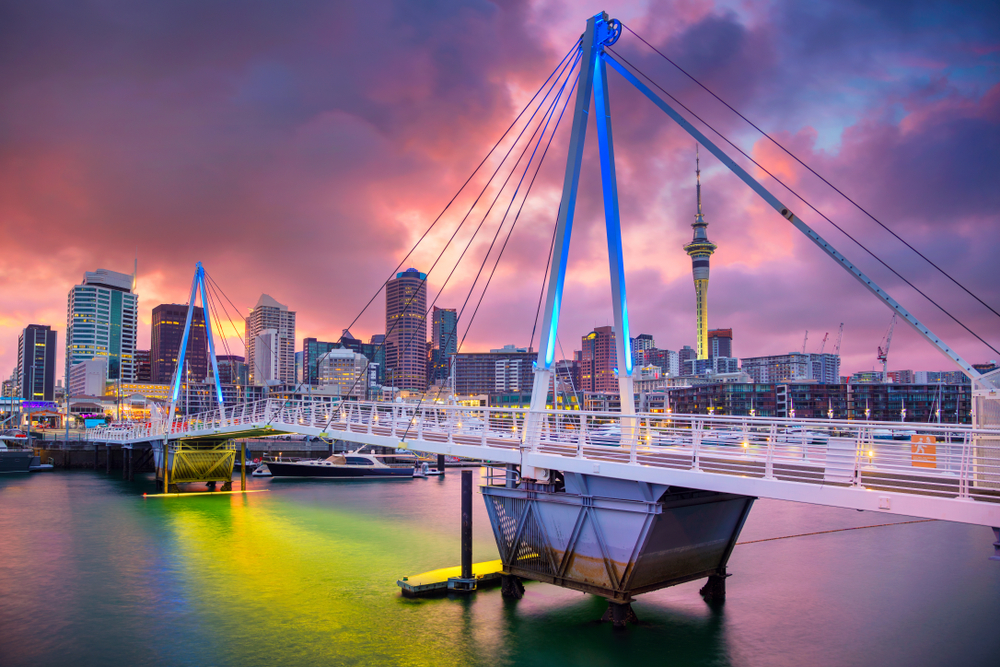 Gorgeous bridge pictured at dusk spanning the waterway in Auckland, one of New Zealand's best places to visit