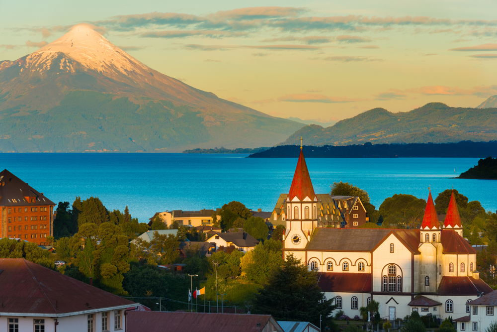 Puerto Varas at the shores of Lake Llanquihue with Osorno Volcano in the background pictured for a roundup of the best places to visit in Chile