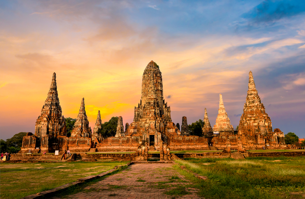 Sun setting over the Auytthaya Historical Park in Thailand