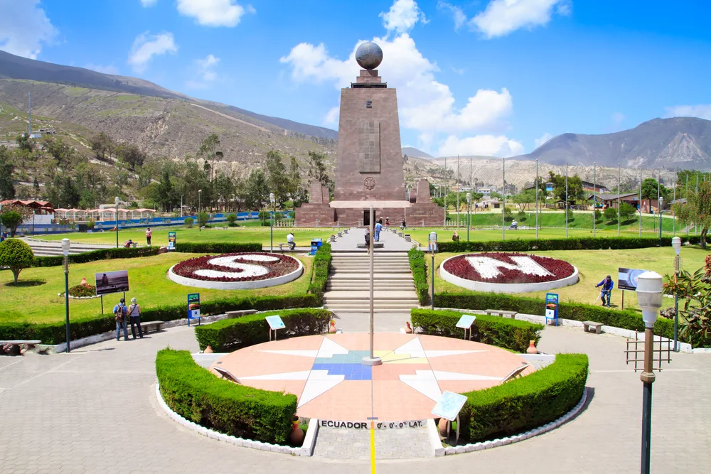 Listed as a piece on the best places to visit in Ecuador, a huge monument stands in the middle of a garden to mark the location of the Equator