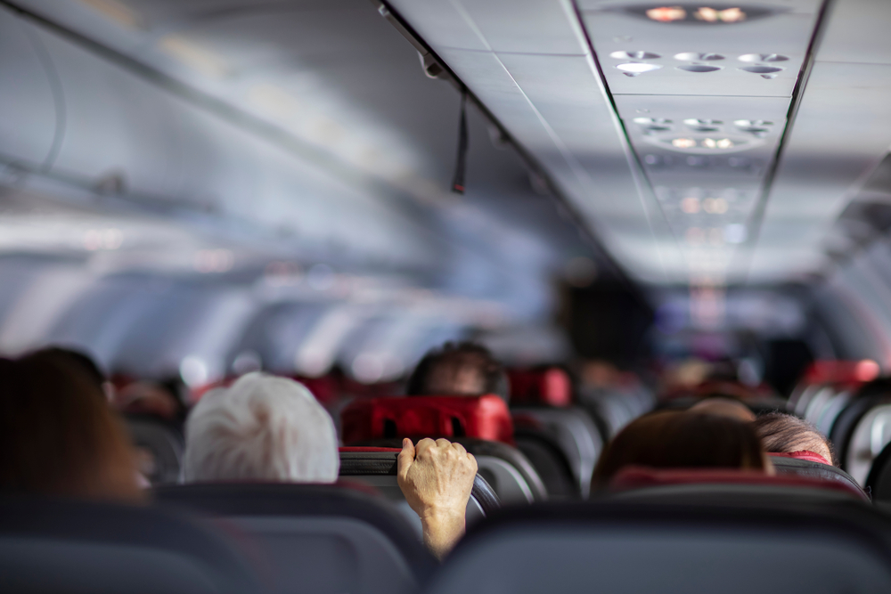 View of airplane full of passengers for a frequently asked questions section on how safe is flying