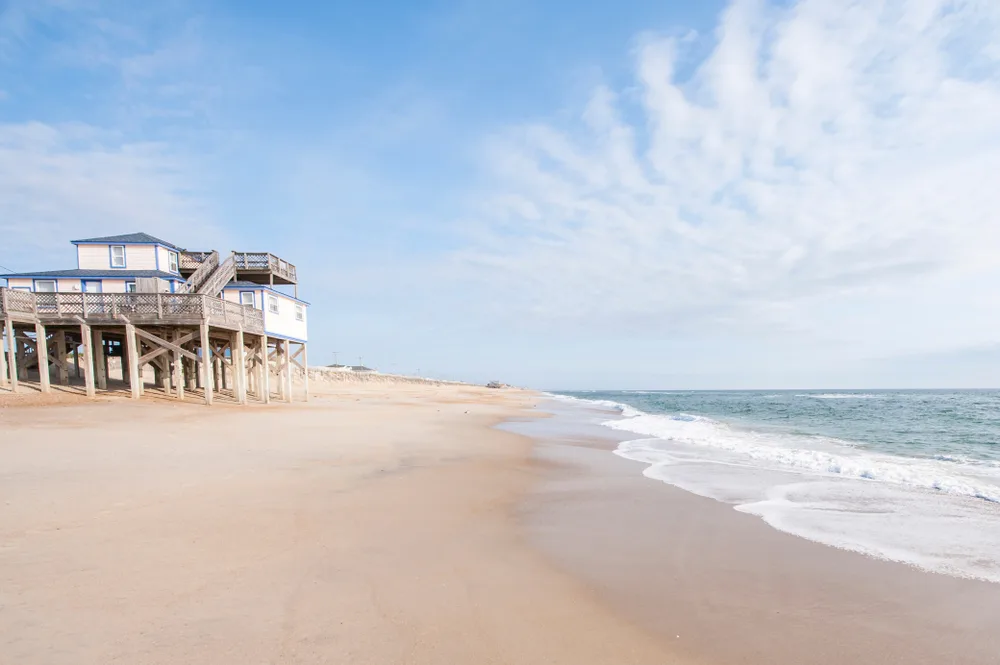 Gorgeous beach meeting the ocean at Kitty Hawk, one of the best places to visit in North Carolina