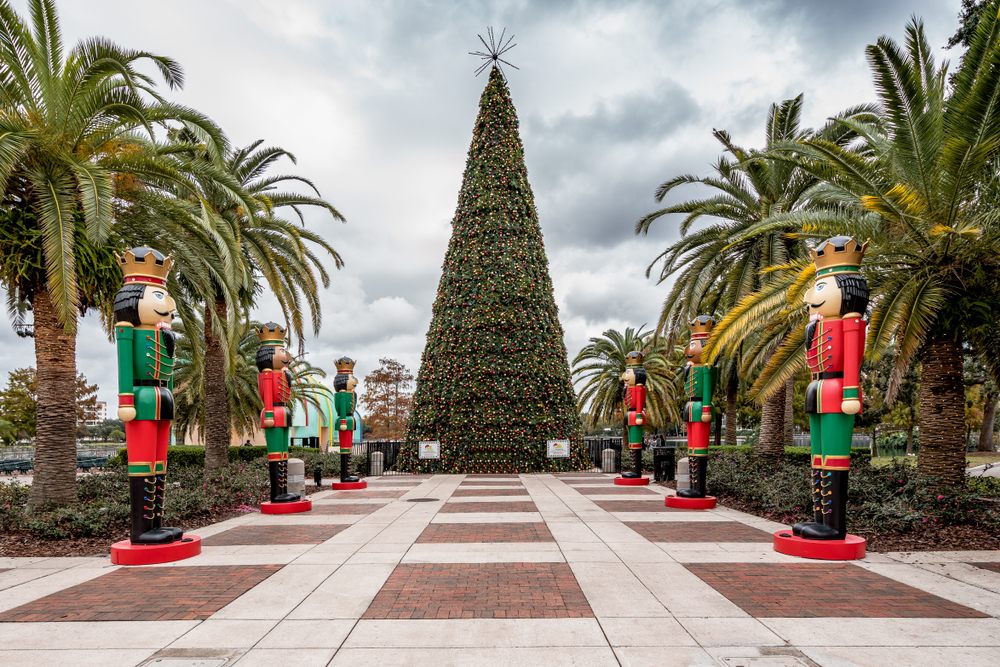 Eola Park in Orlando pictured with Christmas decorations on either side of the park for a piece on the best places to visit during Christmas in the USA