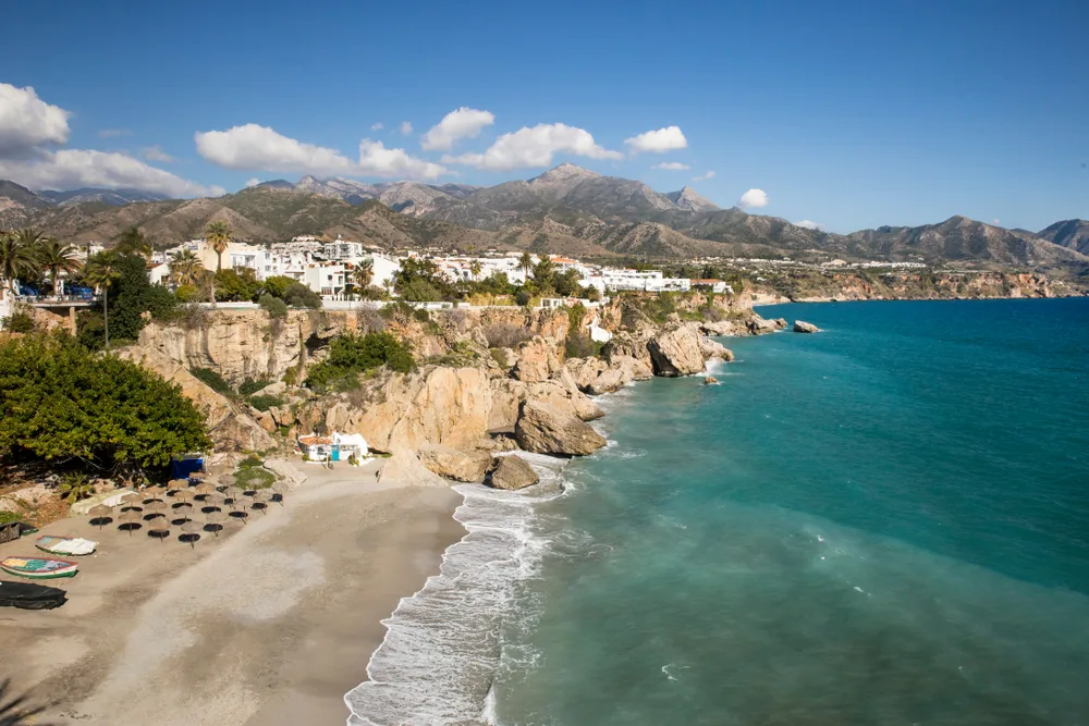 Idyllic region of Andalucia towering over the Playa de la Calahonda from the Balcon de Europa, one of the best places to visit in Spain