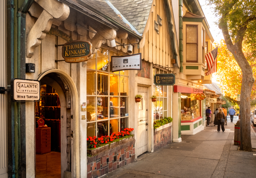 Carmel-by-the-Sea, California, one of the best places to visit during Christmas in the USA, pictured with little shops in the French theme along the main street