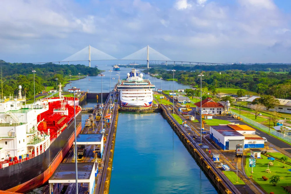 Giant cargo ship entering the Miraflores Locks in the Panama Canal, one of the best places to visit on a trip to Panama