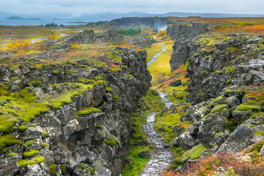 Aerial photo of a walking path between the tectonic plates in the Þingvellir National Park, a must-visit attraction in Iceland