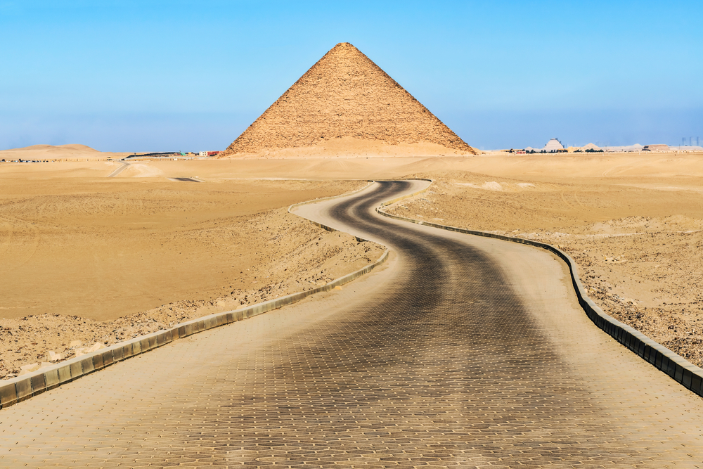 Image of a road winding through the desert in Dahshur, one of our top picks for the best places to visit in Egypt
