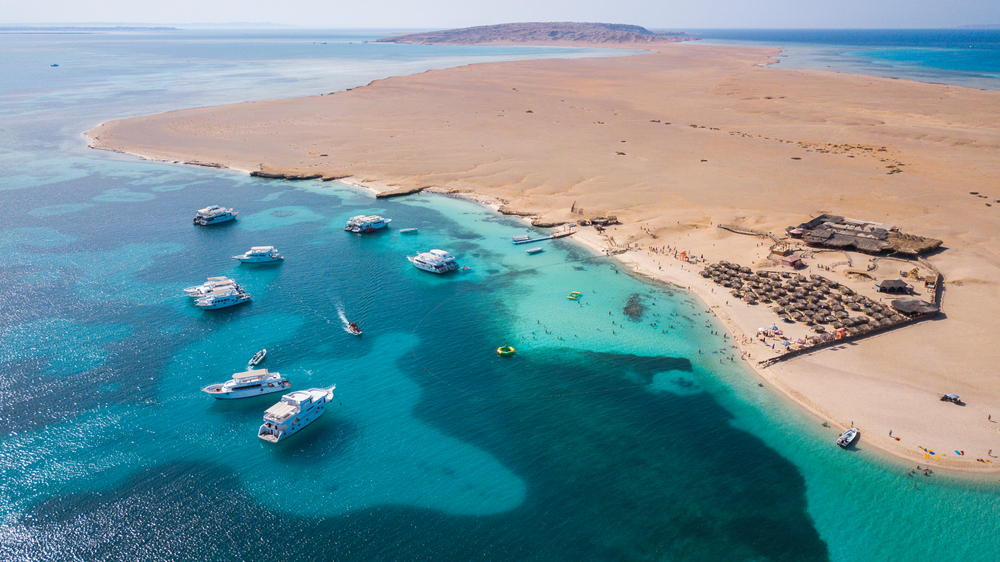 Aerial view of yachts docked in the bay of Giftun Island in Hurghada, in the middle of the Red Sea in Egypt