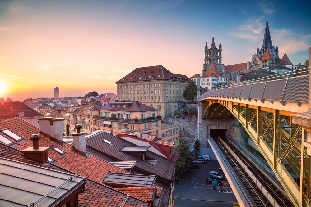 Neat and modern bridge above the historic streets of one of our top picks for must-visit places in Switzerland, Lausanne