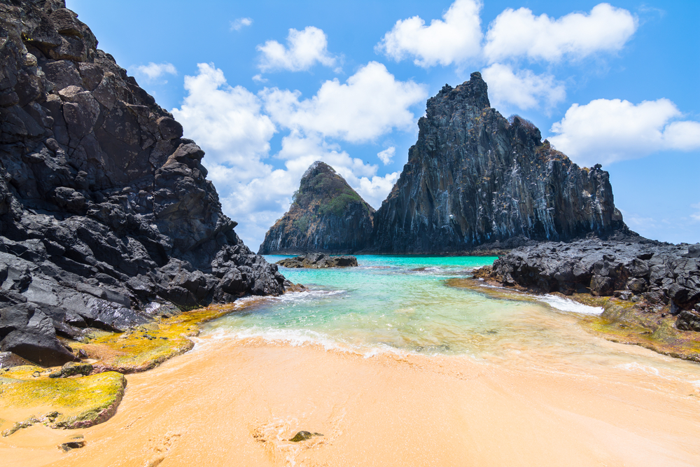 Pigs bay in Fernando de Noronha Island, one of the very best places to visit on a trip to Brazil