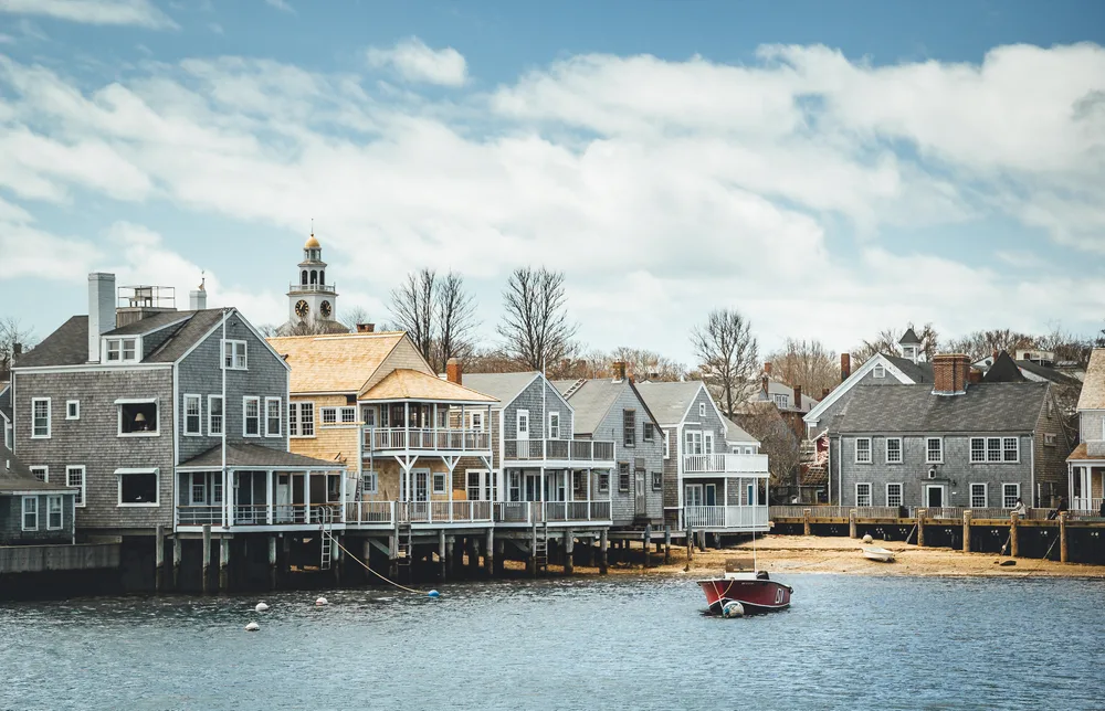 Wooden homes on stilts overlooking the bay in Nantucket, a top pick for day trips from Boston