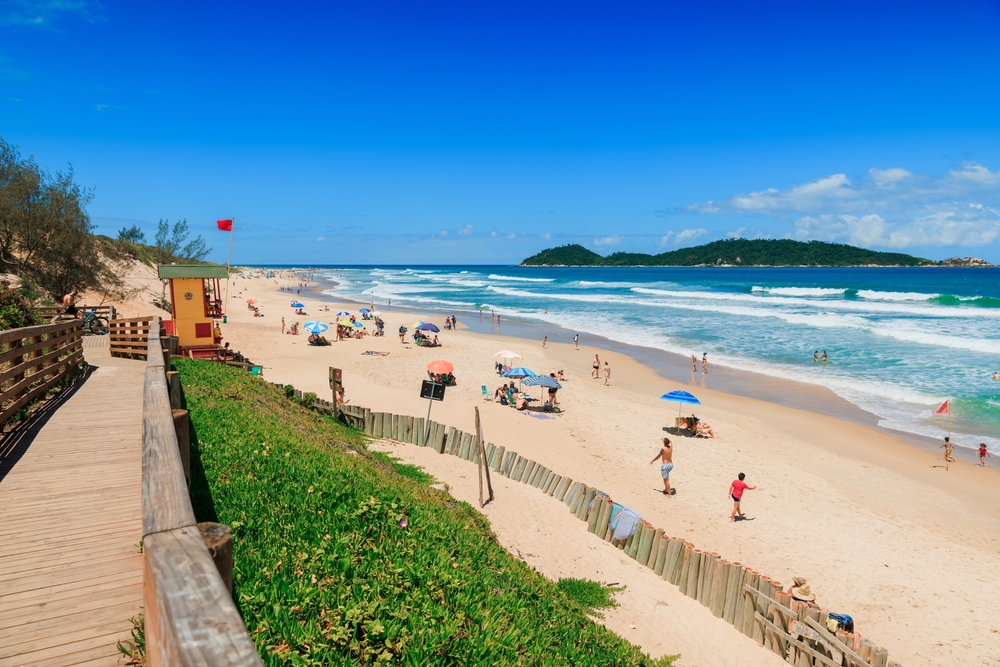 Crowded beach in one of the best places to visit in Brazil, Florianopolis