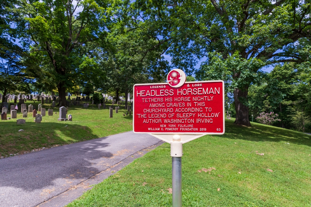 Headless horseman sign in red pictured in Sleepy Hollow, one of the best day trips to take from New York City