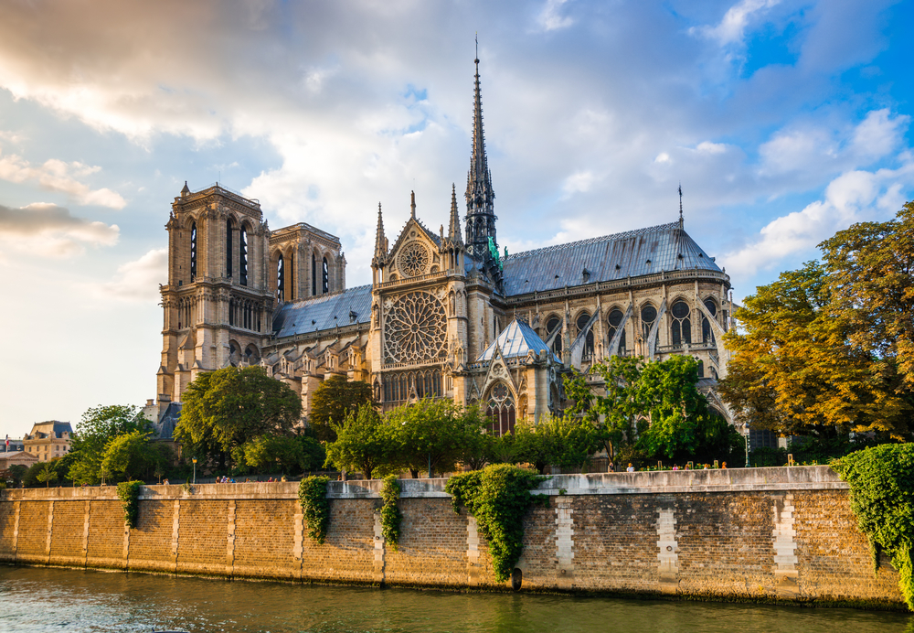 For a roundup of the best places to visit in Paris, a photo of the Cathédrale Notre Dame de Paris taken from the river