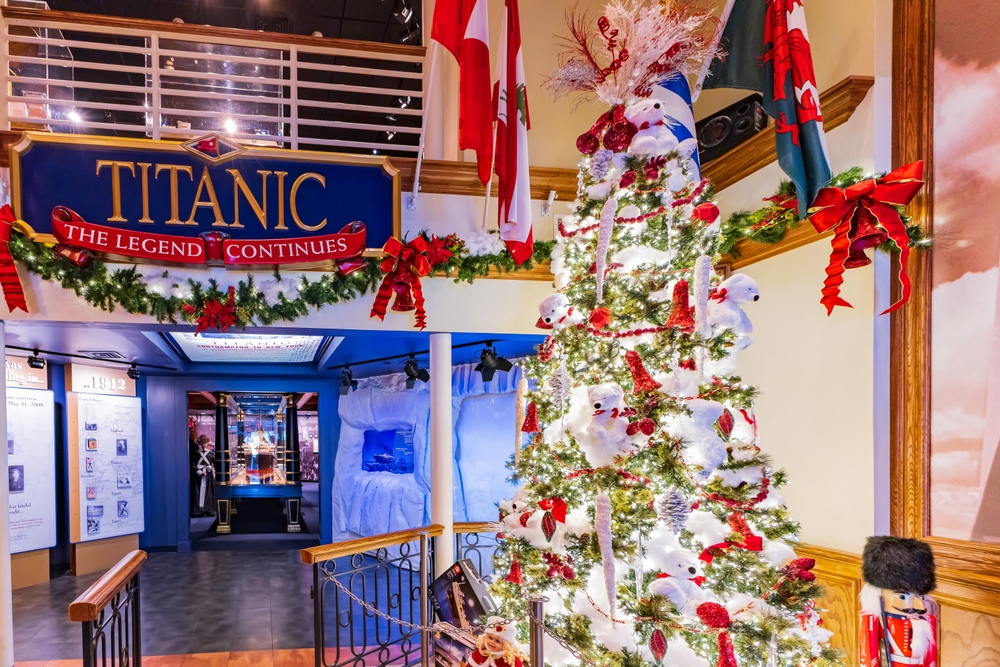 Christmastime inside the Titanic Museum, one of the best places to visit during Christmas in the USA, with Christmas trees and lights in the museum