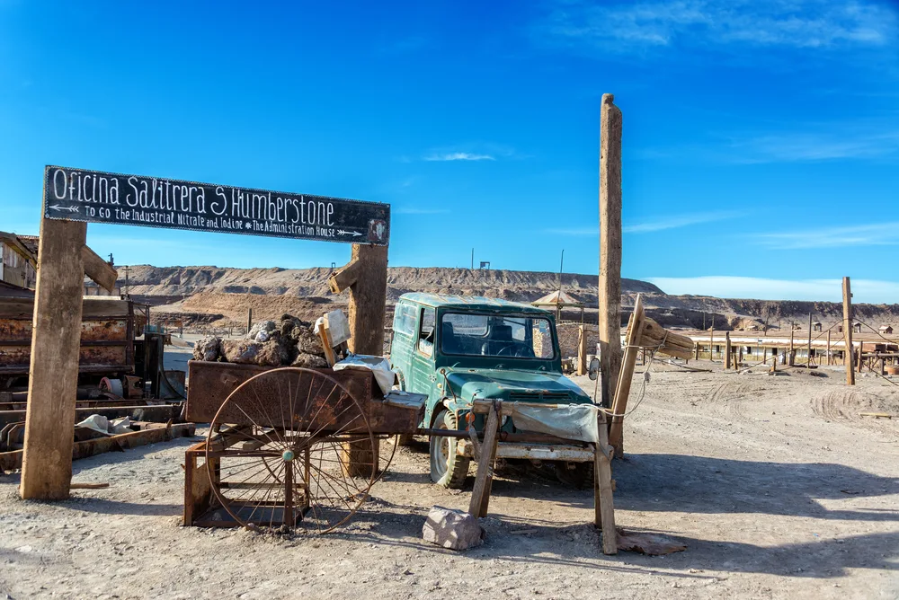 Old truck and sign outside the Humberstone pictured as one of the best places to visit in Chile