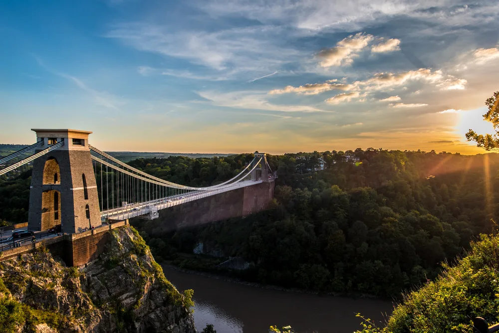 Aerial view of the spectacular Clifton Suspension Bridge, one of the best places to visit in England, as seen at sunrise