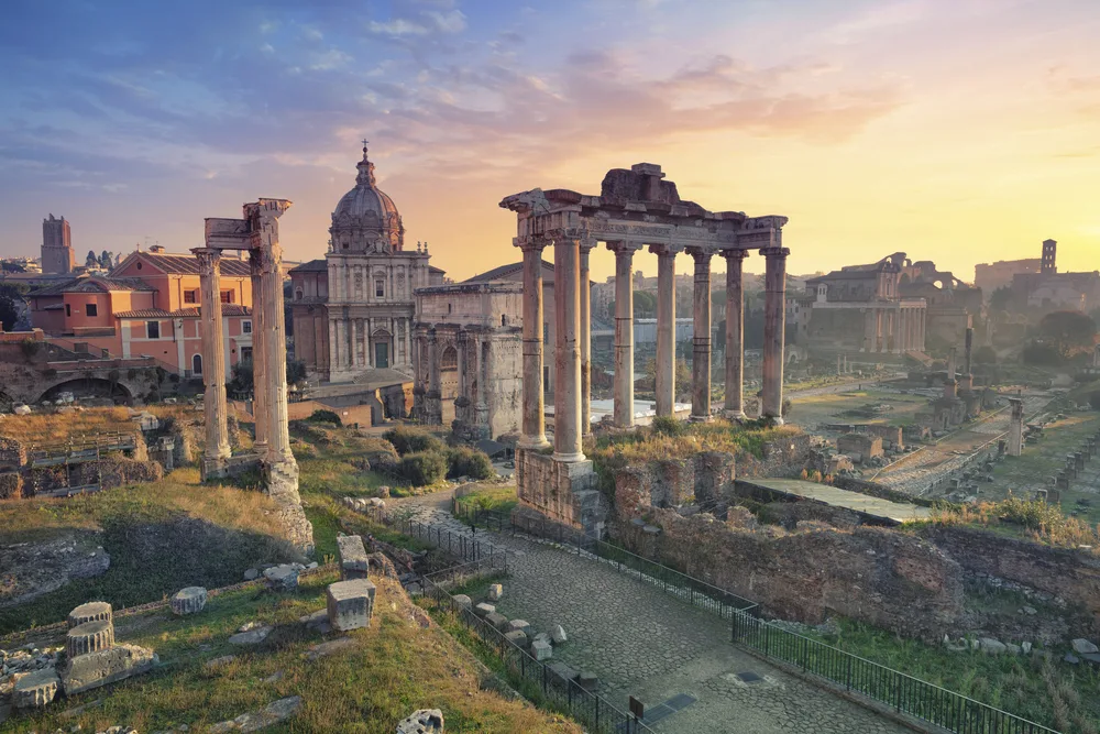 Ruins of the Forum in Rome, one of Europe's best places to visit, seen in the early morning light with hardly anyone around