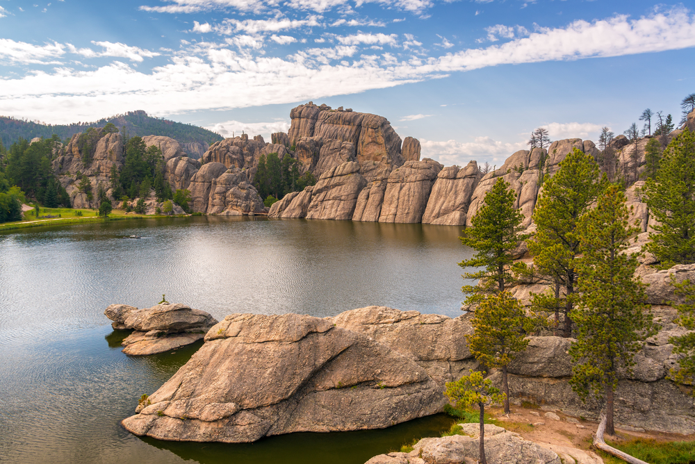 Serene scene as viewed from the rocks overlooking the water in Custer State Park, one of South Dakota's best places to visit