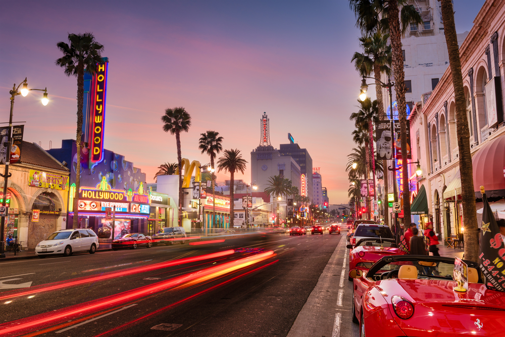 Low-exposure image of Hollywood Boulevard, one of the best places to visit in Southern California, pictured at dusk