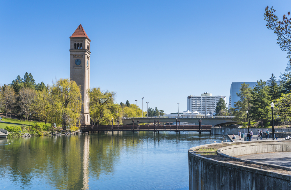 Picture of the clock tower in Spokane pictured from across the river on a nice day in Washington
