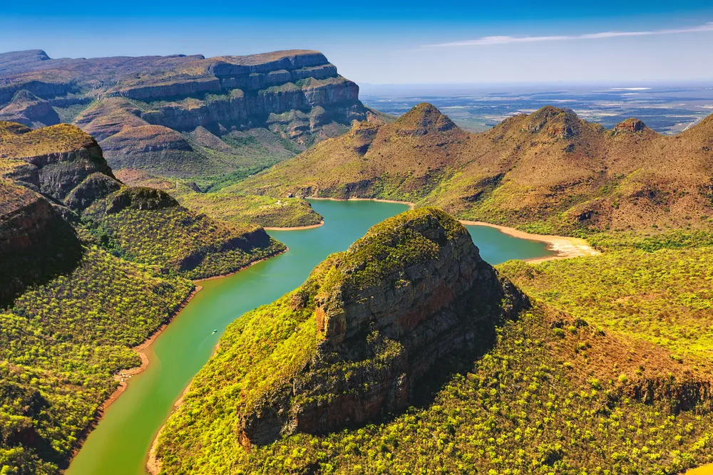 As an image for a piece on the best places to visit in South Africa, an aerial shot of the Blyde River Canyon seen snaking through the Mpumalandga Province