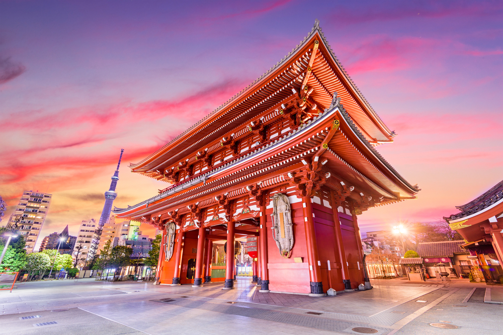 Red exterior walls of the Temple Gate in Tokyo, one of the best places to visit in Asia, on a nice calm evening