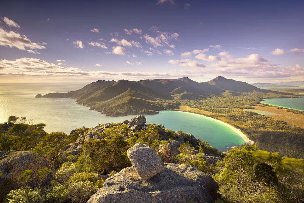 Featured as one of our top picks for the best places to visit in Australia, Wineglass Bay seen well below the photographer in Tasmania