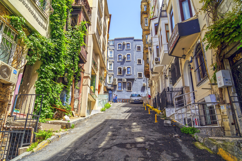 A neat and idyllic street pictured in Sisli, one of the best areas to stay when visiting Istanbul, on a nice day with few people around