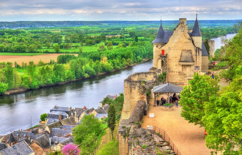 Loire Valley pictured in full view of the reader with the Chateau de Chinon overlooking the river and the valley below