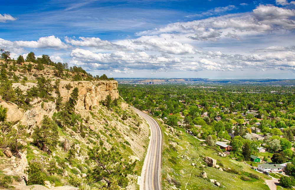 Highway running along the side of a cliff near the Zimmerman Trail in Billings, a top pick for the best areas in Montana