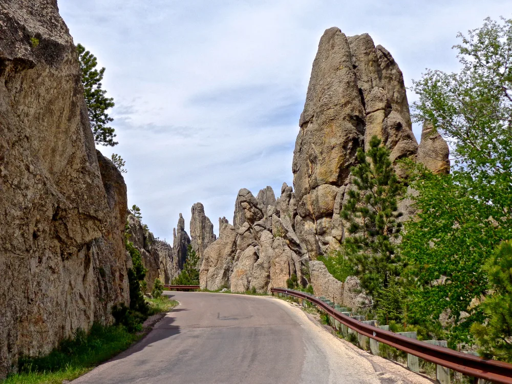 Giant rock formations on either side of the Needles Highway, a top place to visit in South Dakota