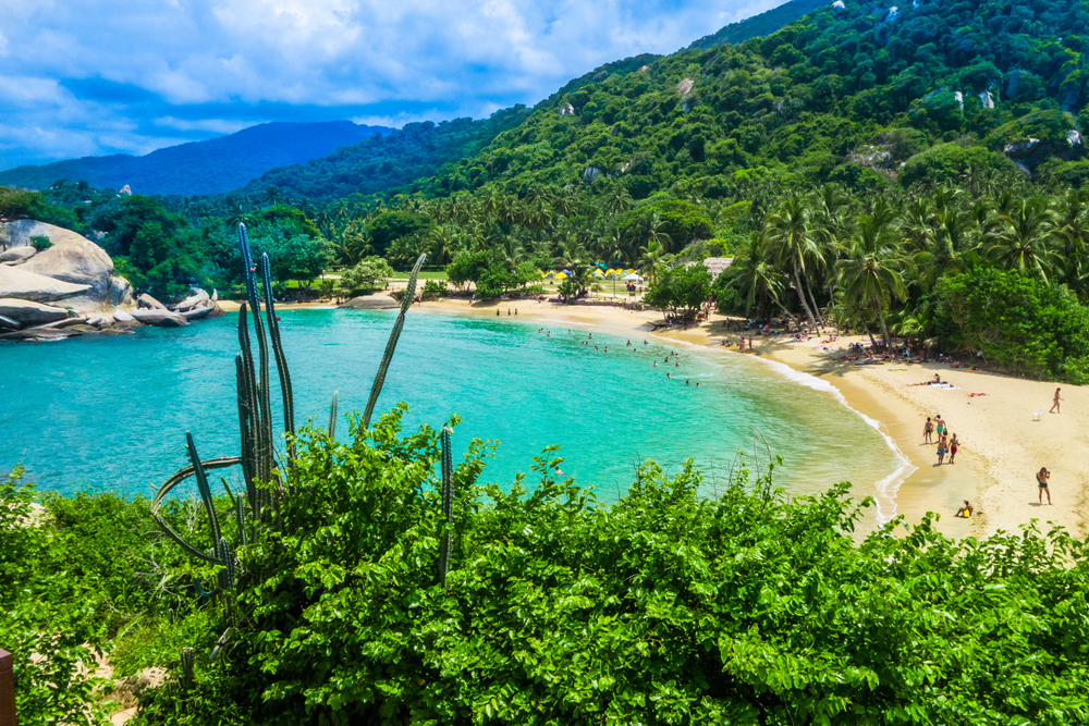 Amazing idyllic view of one of Colombia's must-visit places, Tayrona National Park, pictured with its white sand beaches far below the photographer