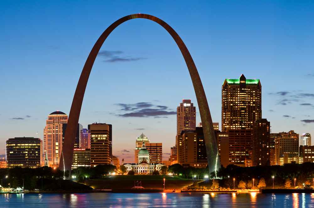 St. Louis, one of the most dangerous cities in the USA with the Gateway Arch and skyline shown at night