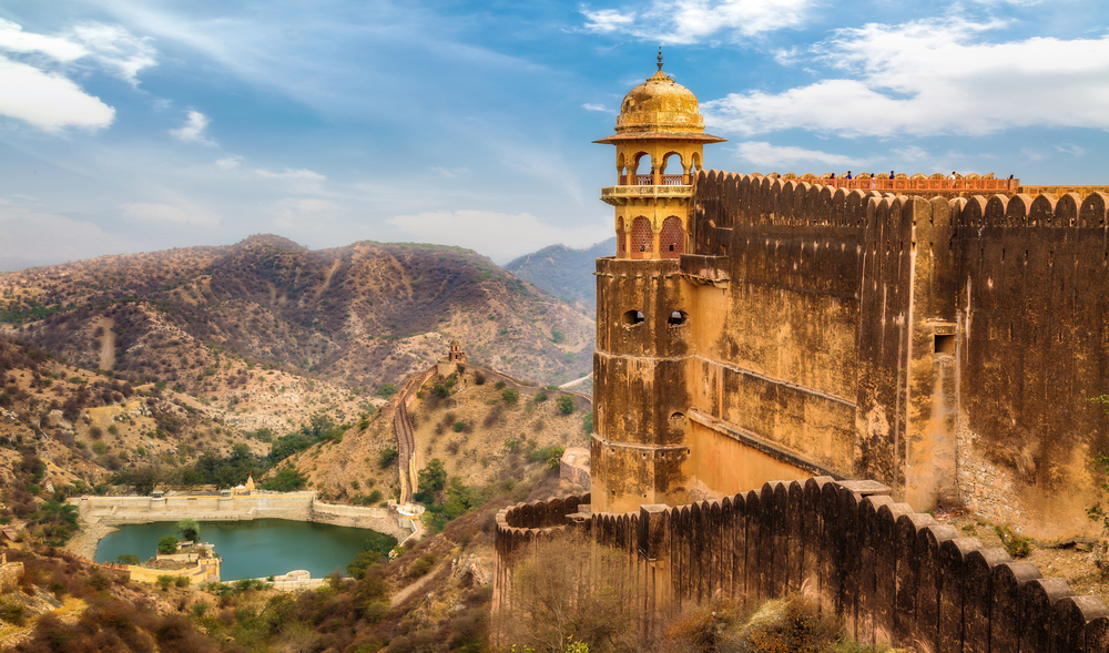 Old castle-like walls of one of Asia's best places to visit, Jaipur, pictured overlooking the city far below