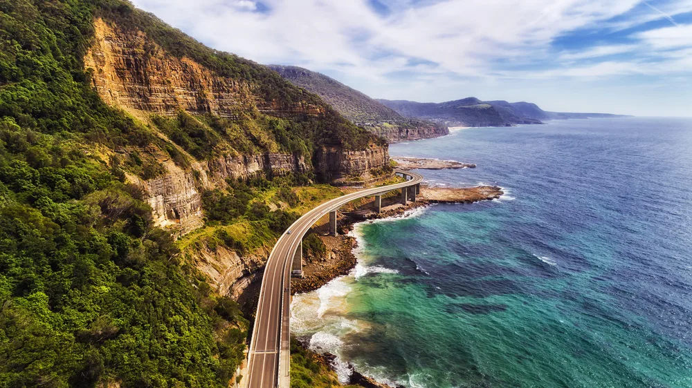 Amazing aerial view of the Pacific Coast Highway pictured running along the ocean
