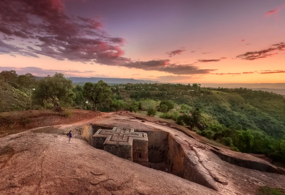 Rock-hewn monolithic church of Saint George in Lalibela at sunset during the cheapest time to visit Ethiopia