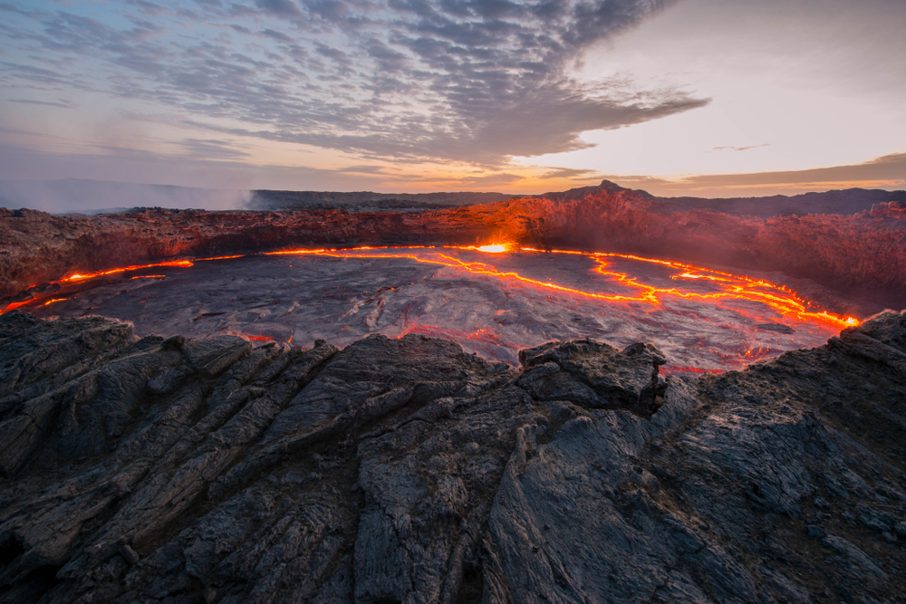 Ertale, the most active volcano in the country, shown with lava lake during the worst time to visit Ethiopia at sunset