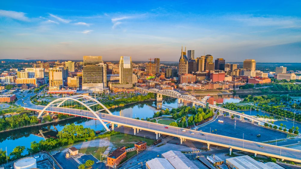Aerial view of downtown Nashville, Tennessee at sunset showing one of the best places to visit in June
