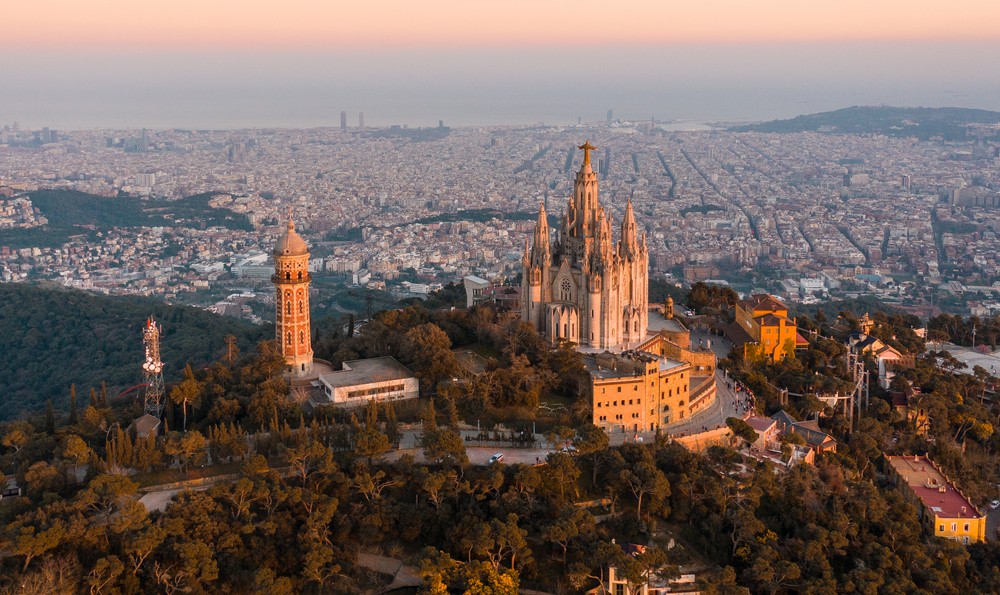 Aerial view of Barcelona showing Sagrat Cor Temple at sunset, depicting one of the best cities to visit in February
