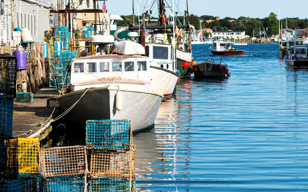 Lobster fishing boats floating on the water of the harbor in Portland Maine