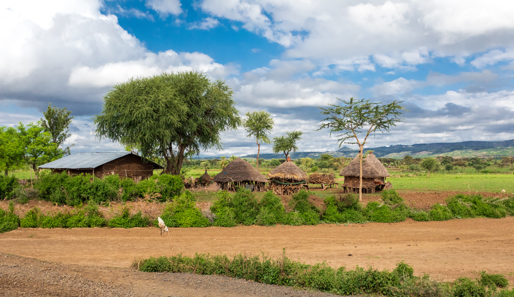 Karat Konso village with cloudy skies and grass huts showing the best time to visit Ethiopia