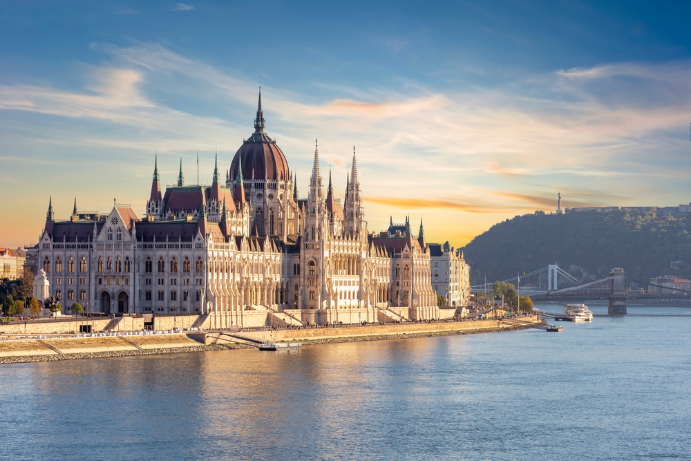 Hungarian Parliament Building at sunset in District V, a top pick for where to stay in Budapest