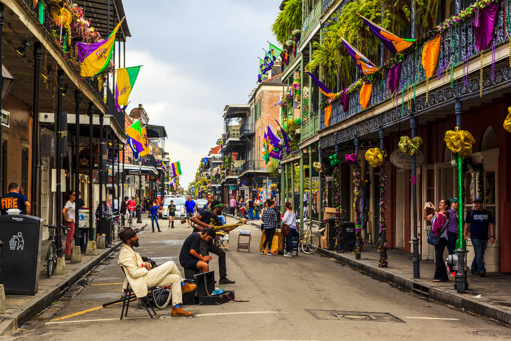Image of a jazz band playing during Mardi Gras in the French Quarter New Orleans, one of the best places to visit during February