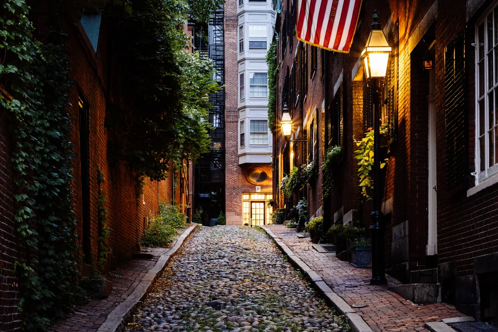 Gorgeous and picturesque Acorn Street in Beach Hill pictured to help answer the question Is Boston Safe to Visit